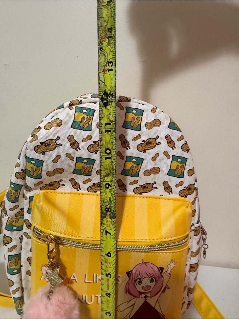 Anya Likes Peanuts Yellow Kids Backpack with Pom Pom Charm - Picture 9 of 11